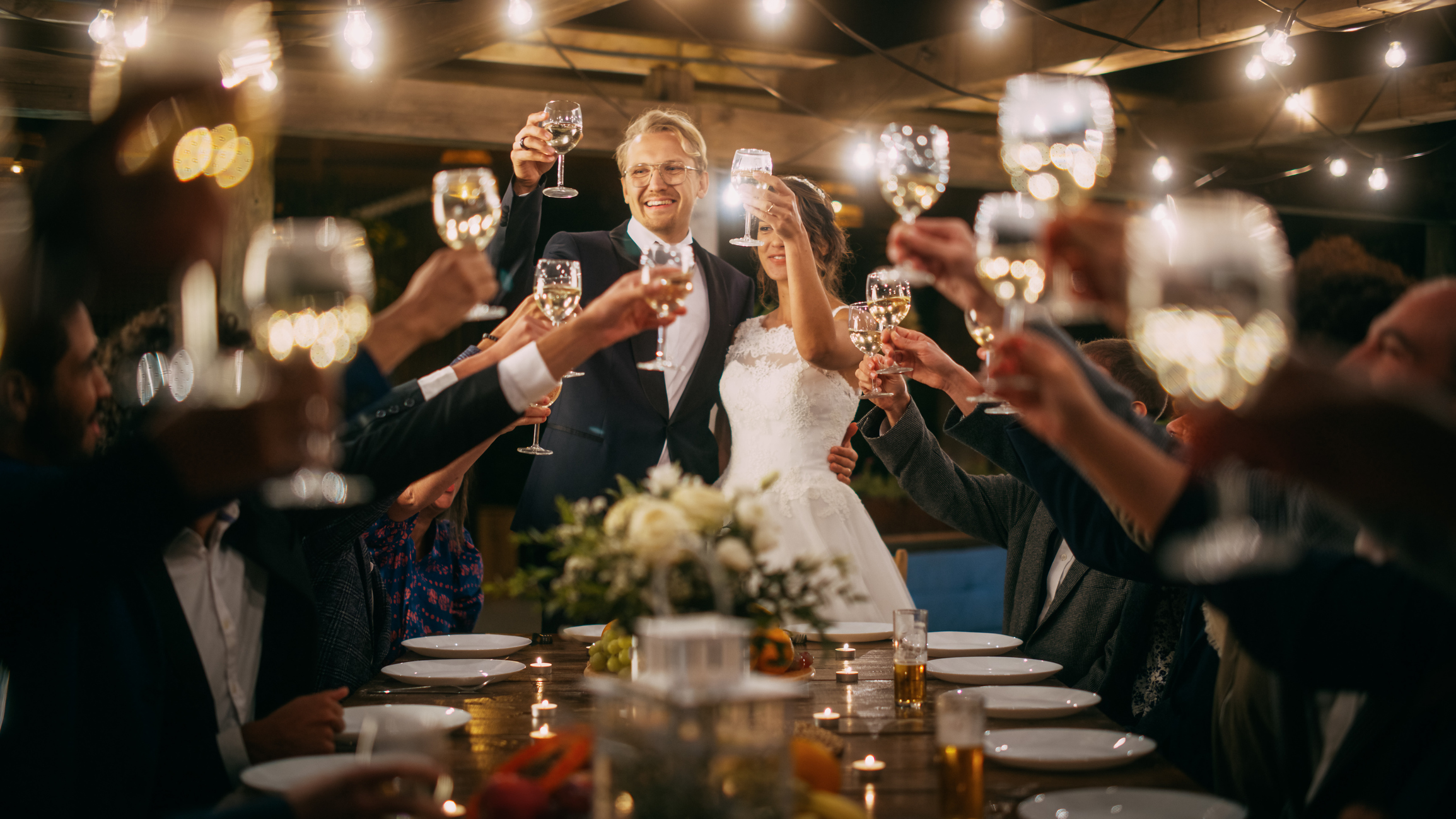 A hardy toast to the Newly Weds at their party.