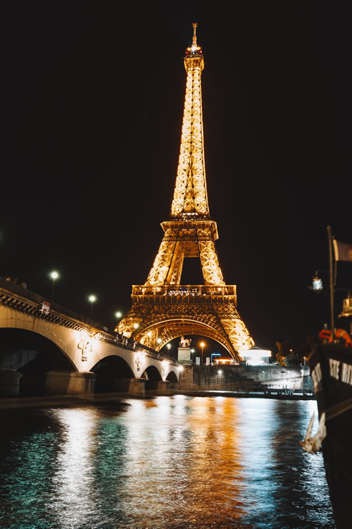 The Eiffel Tower at night in Paris.
